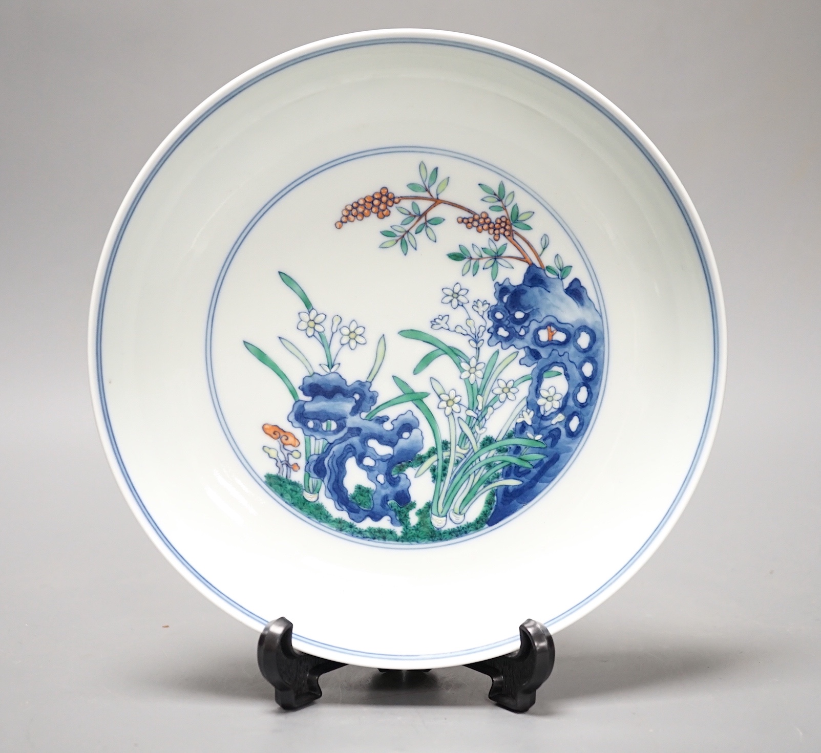 A Chinese doucai saucer dish, Yongzheng mark but later 20cm diameter